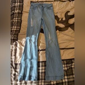 Light Blue Flared Jeans with Distressed Details